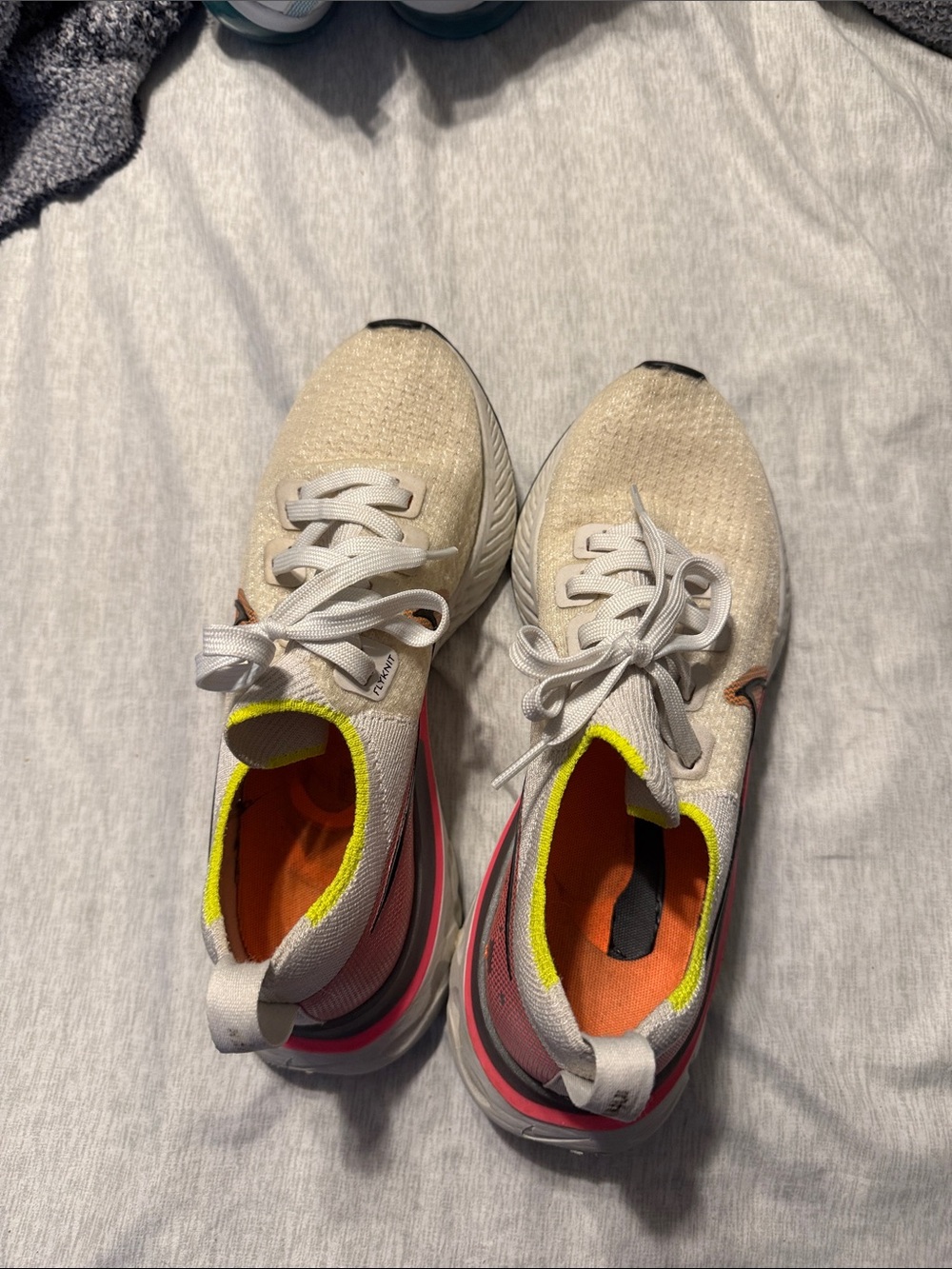 Nike Beige Knit Running Shoes with Neon Pink and Yellow Accents